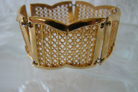 Gold tone vintage '60s art deco style cuff bracelet, $20 at MyLadyJanes